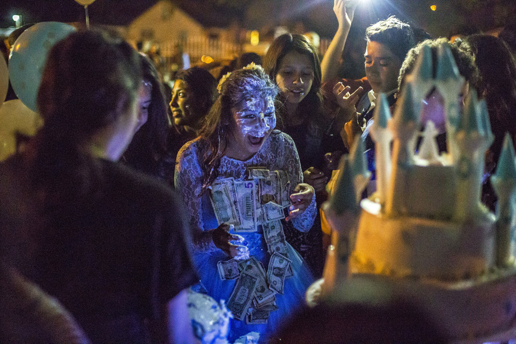 Moriah Ruelez reacts after having cake smashed in her face as part of her 14th birthday celebration outside of La Luz Del Mundo (The Light of the World) church. At 14 young adults in the church are given the opportunity to decide whether or not they would like to stay with the church or leave. In this particular instance Moriah decided to stay. BRIA GRANVILLE