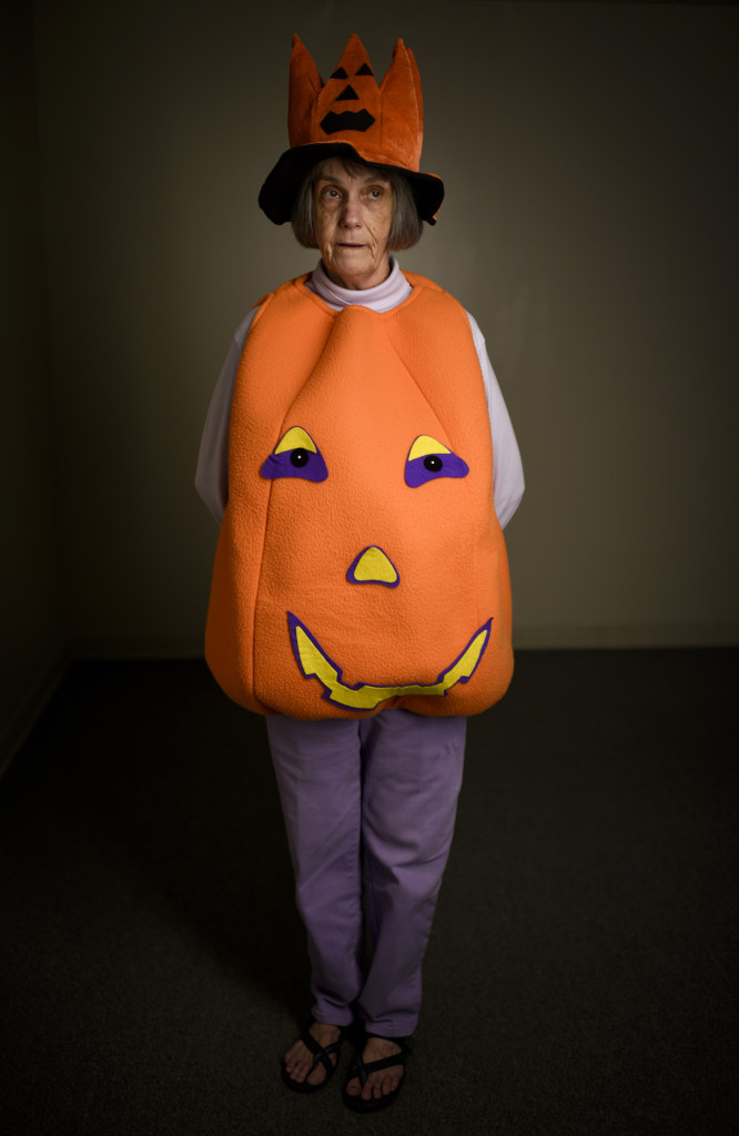"I was the pumpkin because my husband took the clown costume,Ó said Ann Stansbury. Ann, 70, was one of dozens of citizens who dress up during the annual Party Night at the Senior Citizens Center in Frankfort, KY. HARRISON HILL