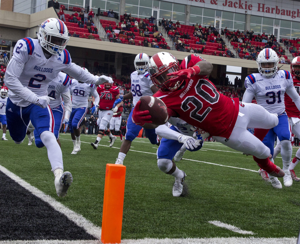 Western Kentucky running back Anthony Wales (20) dives for a touchdown during the C-USA championship game against LA Tech on Saturday Dec. 3, 2016 at L. T. Smith Stadium.