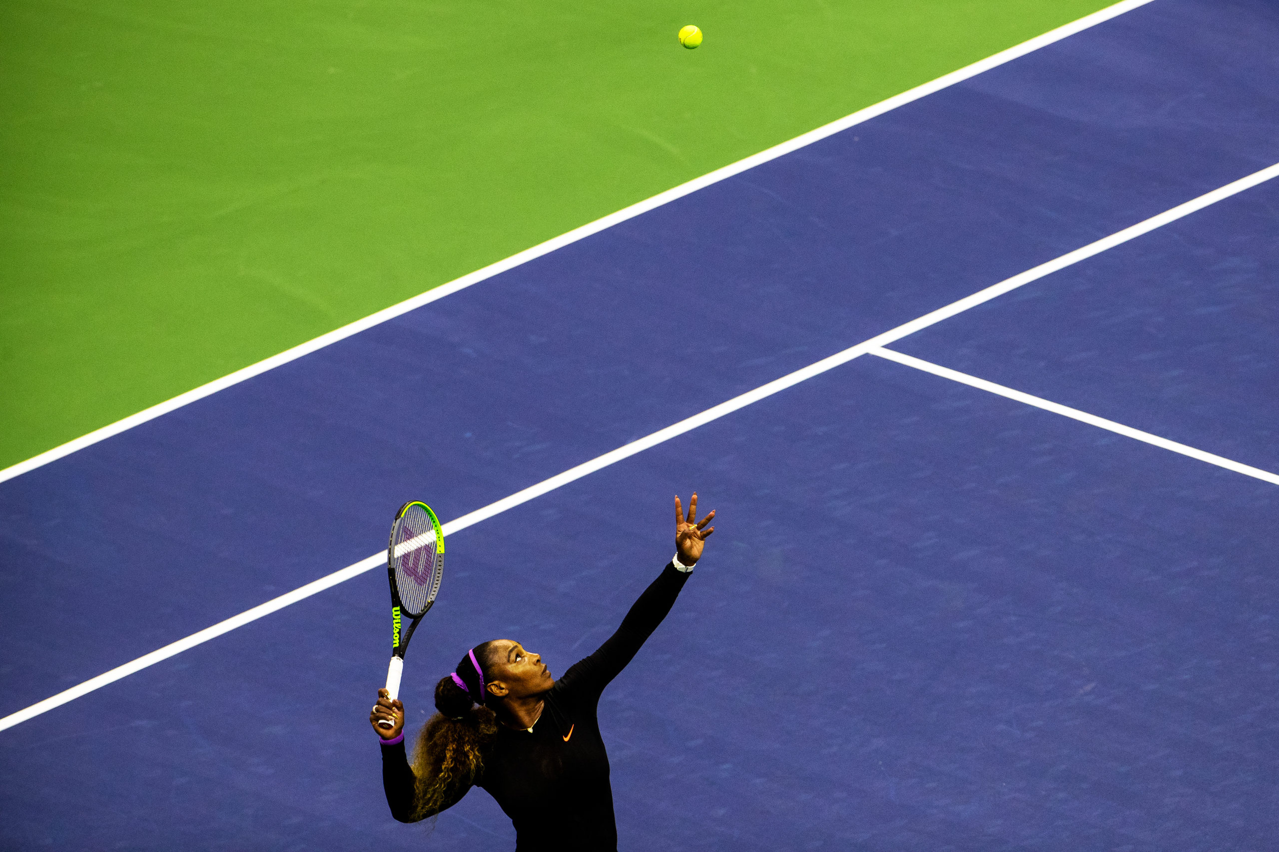 NYTOPEN: FLUSHING, NY. - August 26, 2019: Serena Williams serves to Maria Sharapova in the first round of the US Open at Arthur Ash Stadium in Flushing, New York. CREDIT: Demetrius Freeman for The New York Times